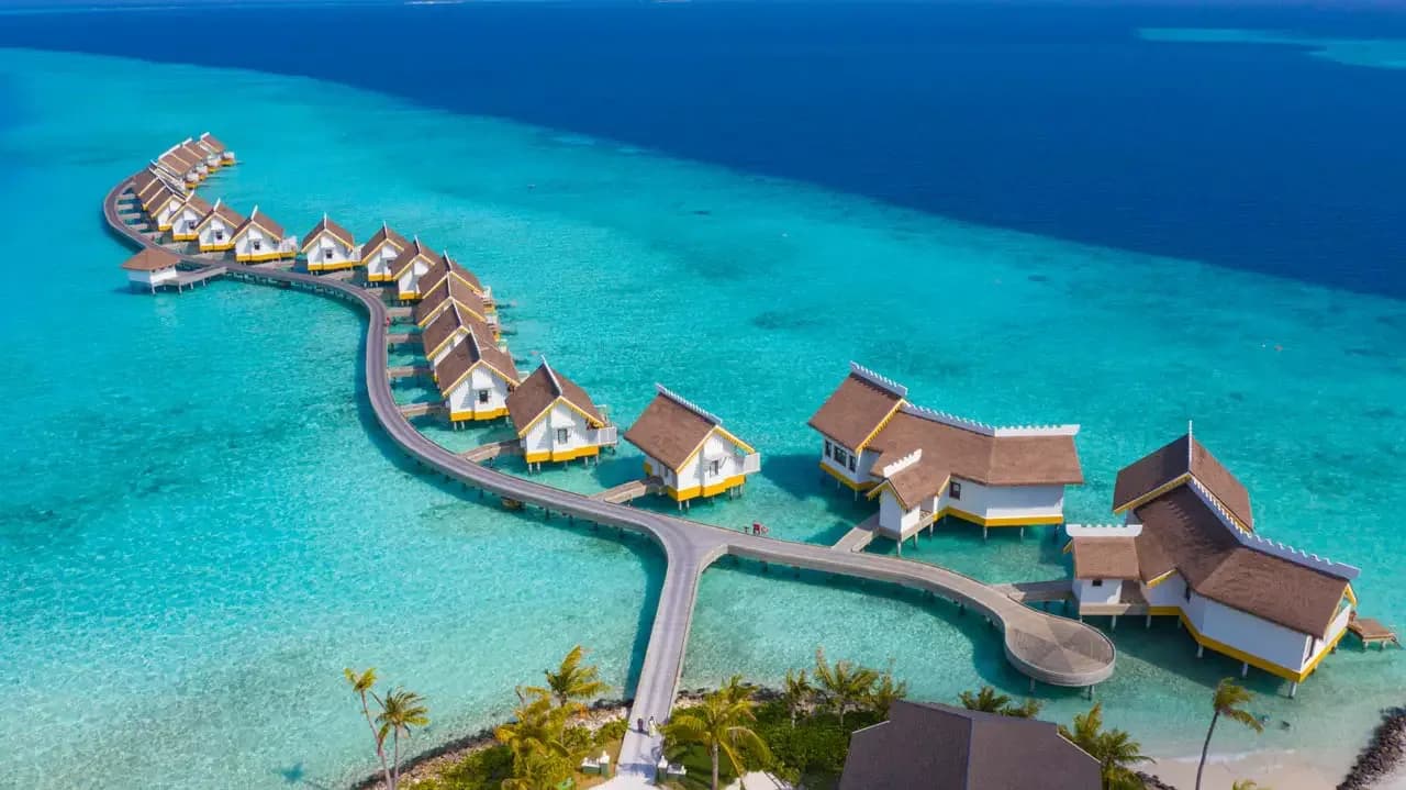 SAii Lagoon Maldives, Curio Collection by Hilton, hero, South Malé Atoll, Maldives, afternoon light over the lagoon