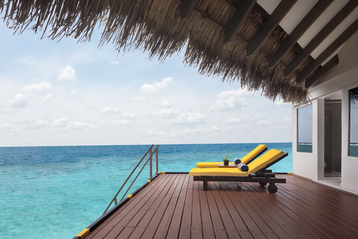 Adaaran Club Rannalhi, villa overwater, South Malé Atoll, Maldives, Water Bungalow at the over-water jetty configuration.