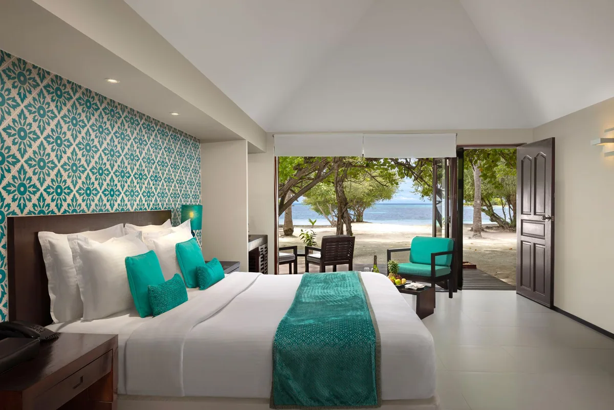 Adaaran Select Hudhuranfushi, villa beach, North Malé Atoll, Maldives, Sunset Beach Villa at the sunset-facing perimeter configuration.
