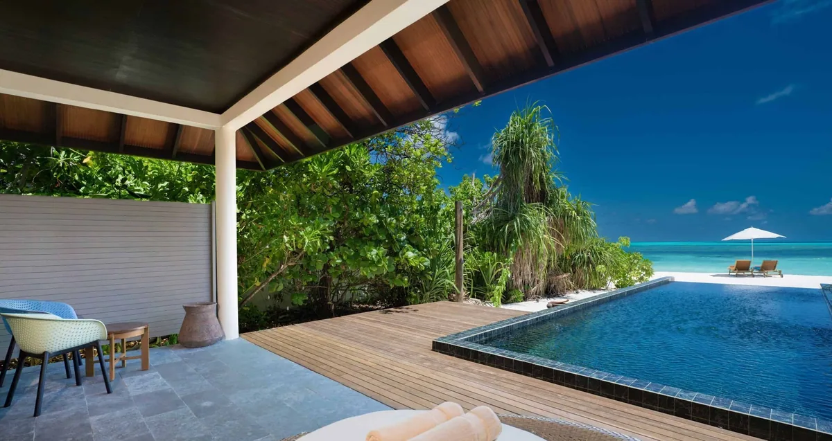 Atmosphere Kanifushi Maldives, villa beach, Lhaviyani Atoll, Maldives, Sunset Beach Pool Villa at the western sunset-orientation edge.