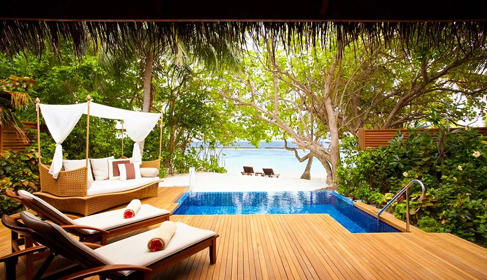 Baros Maldives, villa beach, North Malé Atoll, Maldives, Water Pool Villa at the lagoon-side jetty configuration.