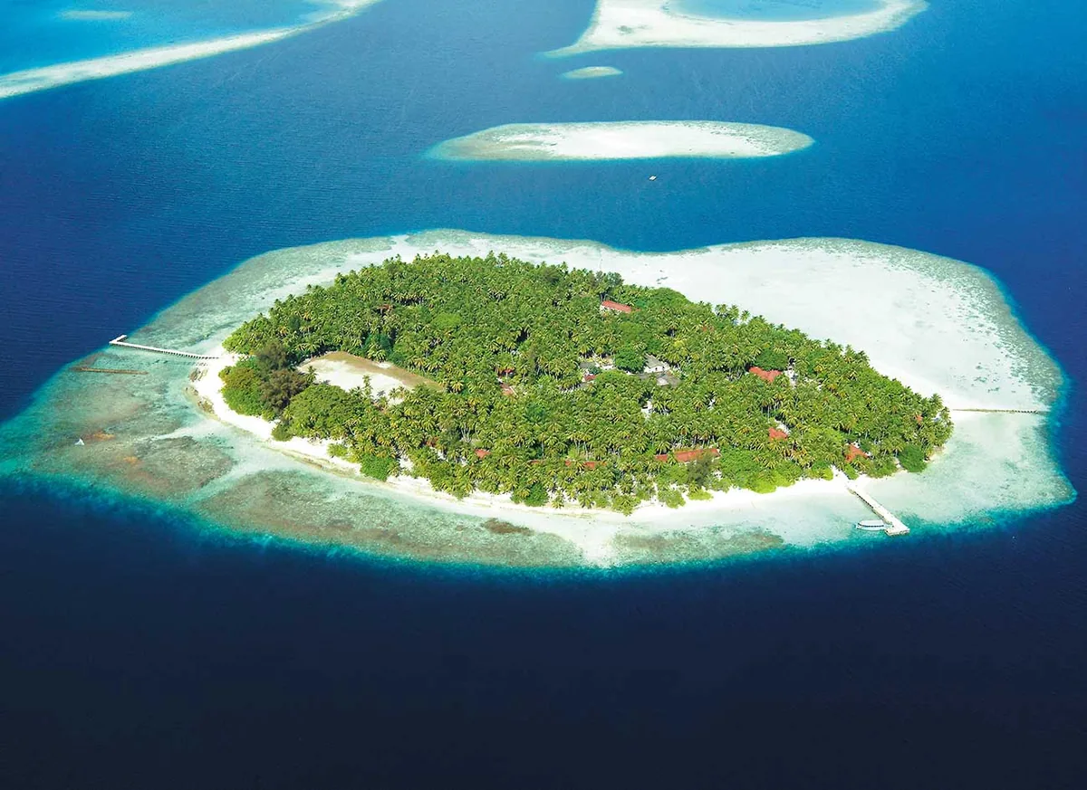 Biyadhoo Island Resort, aerial, South Malé Atoll, Maldives, Biyadhoo Island Resort, the Biyadhoo island geometry in central South Malé Atoll with the fringing house reef configuration and the beach perimeter villa cluster.