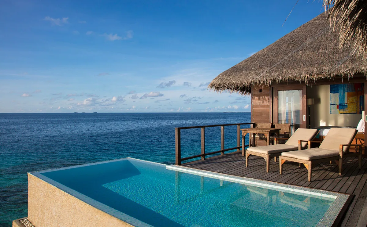 Coco Bodu Hithi, villa overwater, North Malé Atoll, Maldives, Escape Water Villa at the over-water jetty configuration.