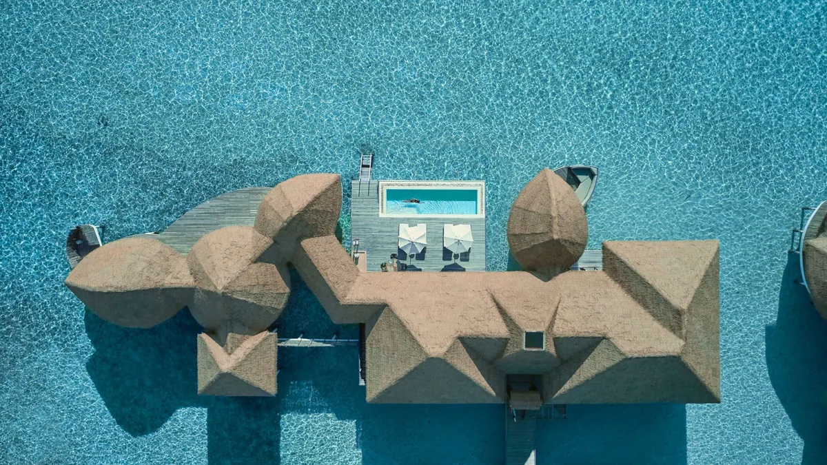 COMO Maalifushi, villa overwater, Thaa Atoll, Maldives, Water Villa at the over-water configuration.