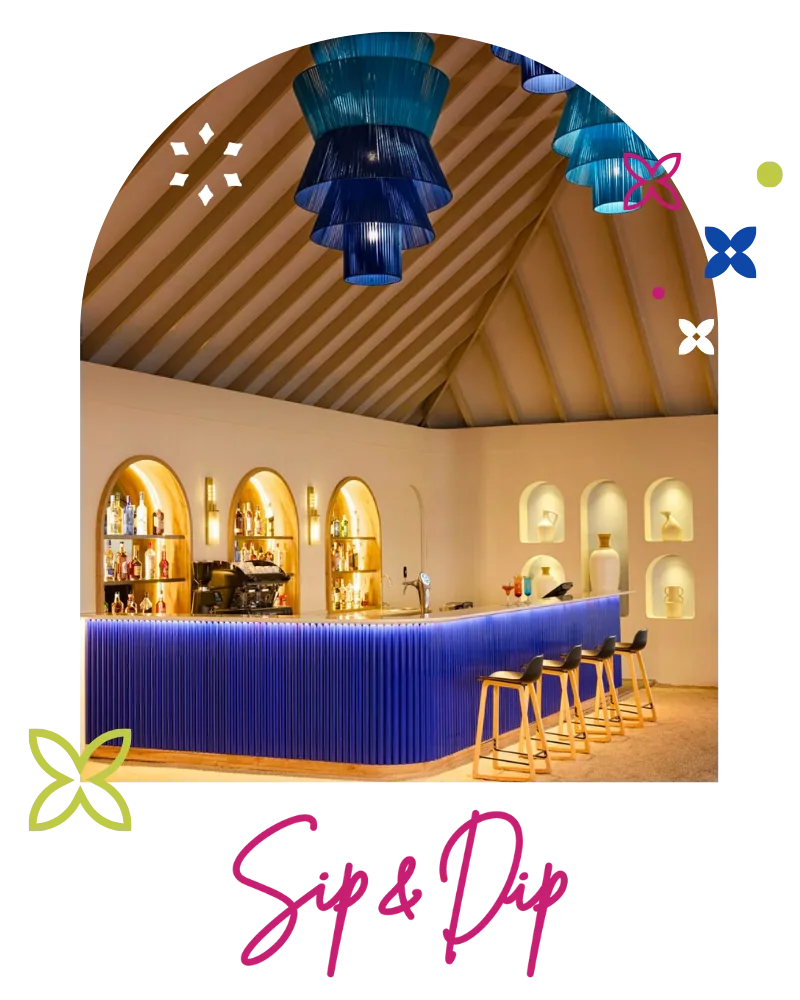 Eri Maldives, bar, North Malé Atoll, Maldives, Sip and Dip bar interior: distinctive Moorish-style arched vaulted ceiling with radial timber rafters forming a smaller dome, a striking deep-navy mosaic-tiled bar counter, rattan-seat bar stools, niche shelves with bottle displays, the property's signature bar architecture under warm lighting.
