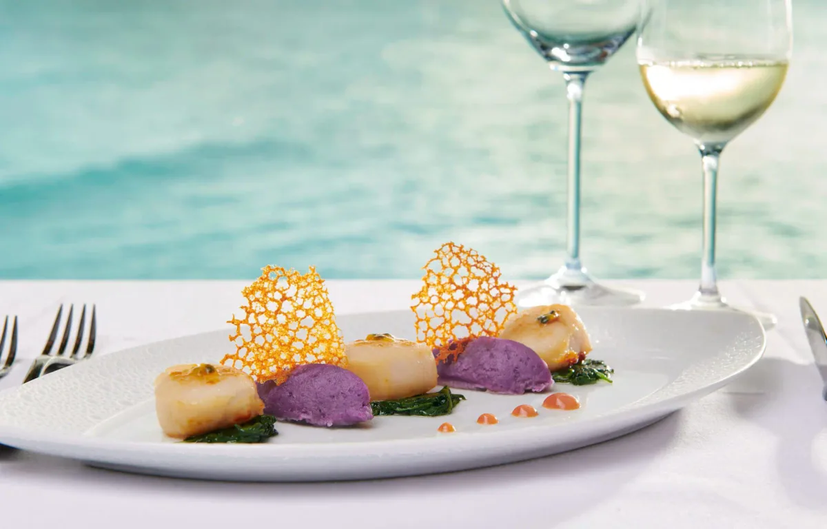 Sirru Fen Fushi Private Lagoon Resort, Azure fine dining plated scallops on purple sweet potato puree with tuile lace and white wine over the lagoon, Shaviyani Atoll, Maldives