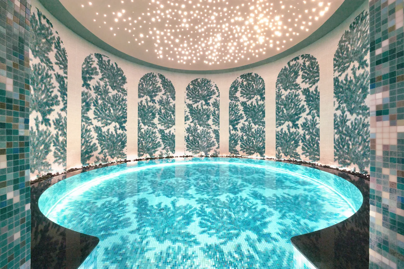 JOALI BEING, spa, Raa Atoll, Maldives, KAASHI Hydrotherapy Hall, circular pool with coral-motif tiled walls and a starlit fibre-optic ceiling, the venue for the watsu programme inside the central spa.