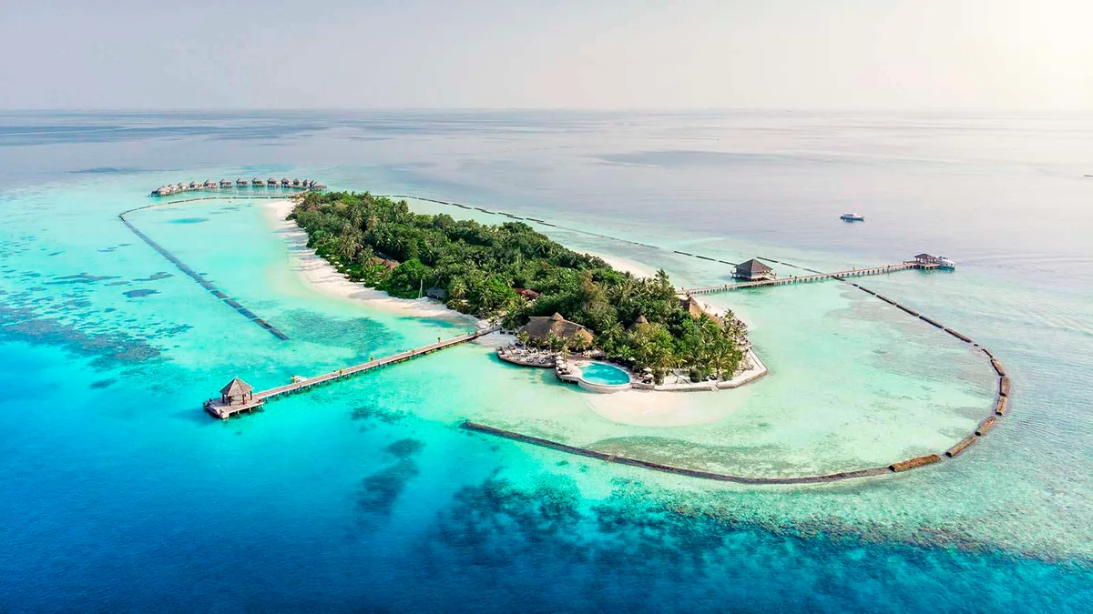 Komandoo Island Resort, aerial, Lhaviyani Atoll, Maldives, Komandoo Island Resort, the small natural-island geometry in northern Lhaviyani Atoll.