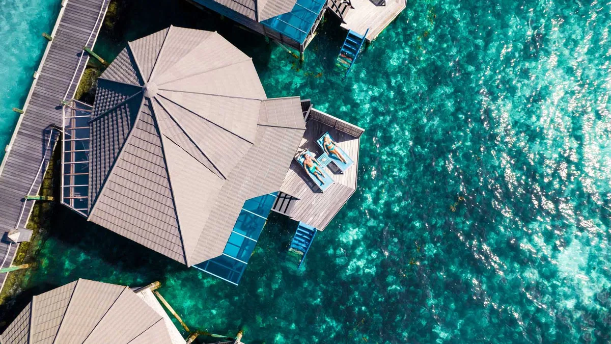 Kuredu Resort Maldives, villa overwater, Lhaviyani Atoll, Maldives, Sangu Water Villa at the over-water jetty configuration.