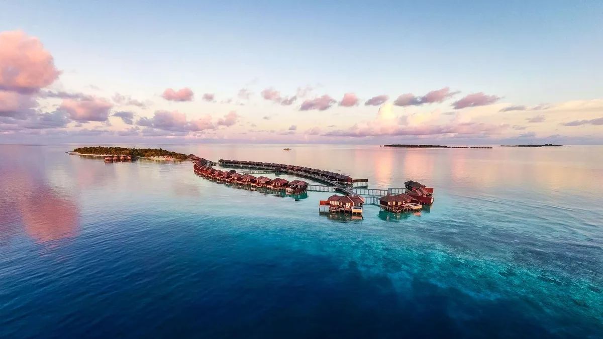 Lily Beach Resort & Spa, aerial, Alif Dhaal (South Ari) Atoll, Maldives, Lily Beach Resort & Spa, Huvahendhoo island in northern Alif Dhaal Atoll (South Ari) with the dual overwater jetty configuration.