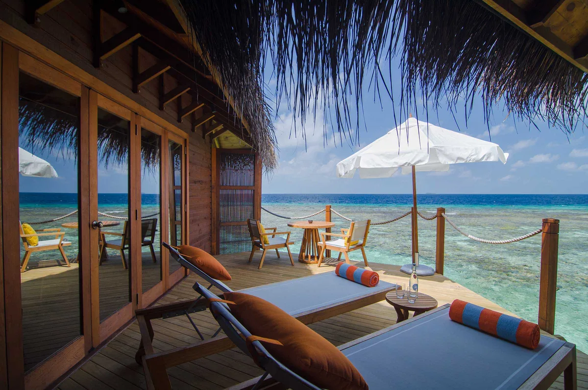 Mirihi Island Resort, villa overwater, Alif Dhaal (South Ari) Atoll, Maldives, Deluxe Water Villa, the lagoon-side boutique configuration.