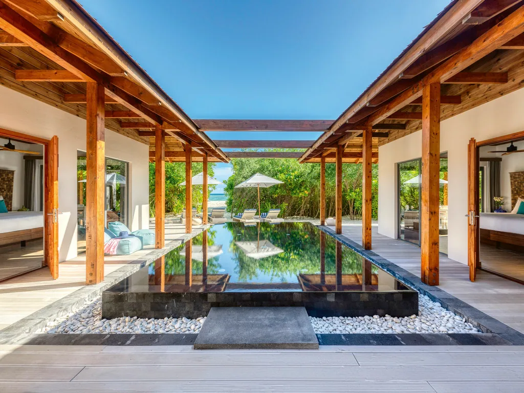 Mövenpick Resort Kuredhivaru, Four Bedroom Beach Pool Residence courtyard pool with pergola corridor, Noonu Atoll, Maldives