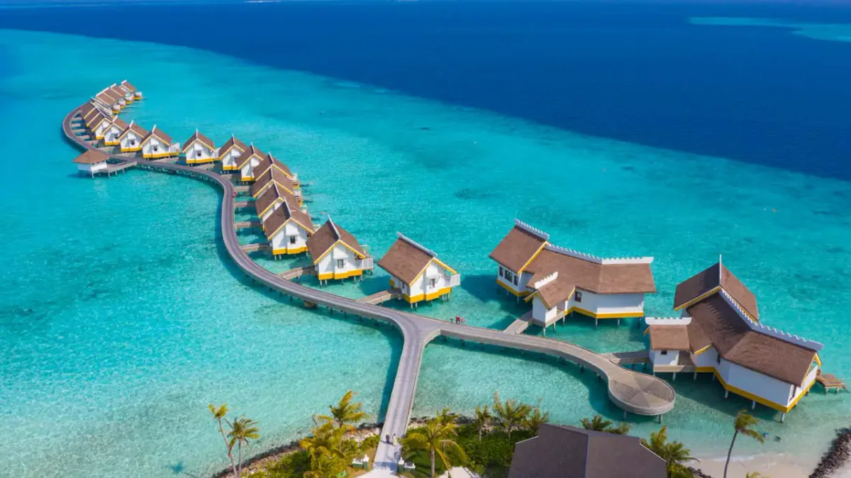 SAii Lagoon Maldives, Curio Collection by Hilton, aerial, South Malé Atoll, Maldives, SAii Lagoon Maldives Curio Collection by Hilton, the Emboodhoo Finolhu island geometry within the Crossroads Maldives integrated-development cluster (SAii Lagoon + Hard Rock + Marina precinct on adjacent sections of one island plus connected geography).