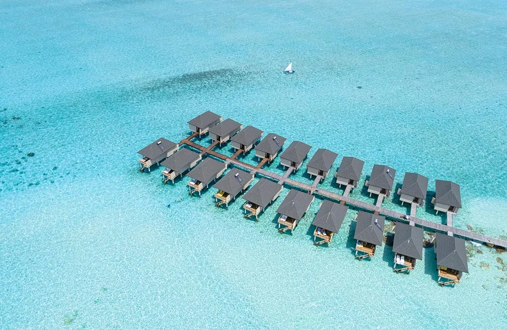 Summer Island Maldives, aerial, North Malé Atoll, Maldives, Summer Island Maldives, the Ziyaaraifushi island geometry in northern North Malé Atoll with the over-water jetty cluster and the 3D-printed-reef-module house-reef arrangement.
