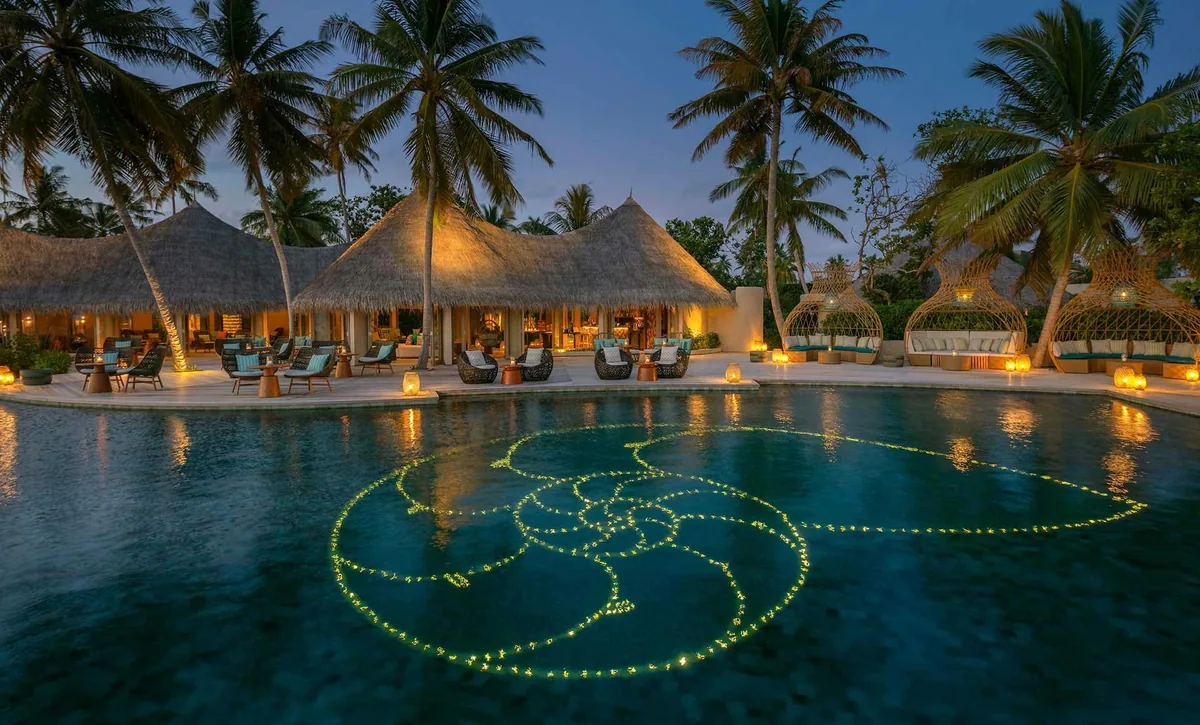 The Nautilus Maldives, villa overwater, Baa Atoll, Maldives, Ocean House at the over-water jetty extension with private pool and dedicated indoor-and-outdoor dining configuration.