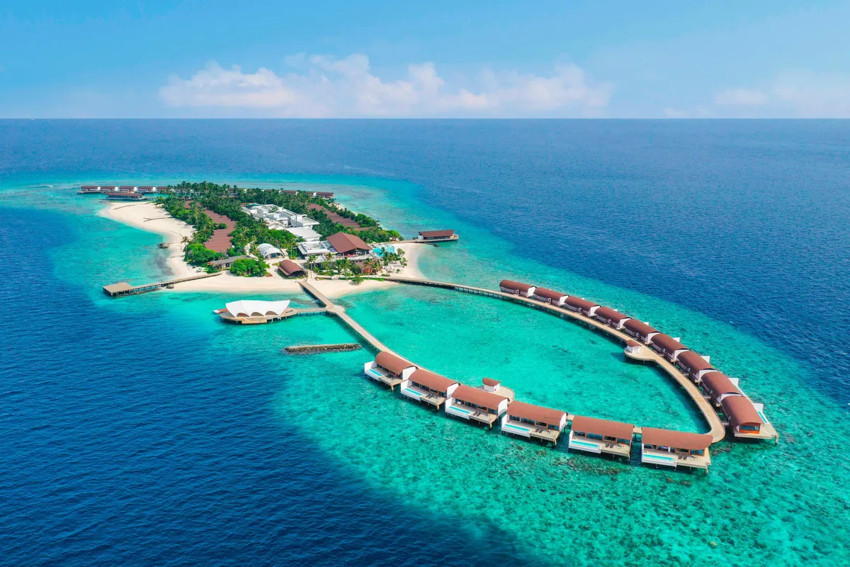 The Westin Maldives Miriandhoo Resort, aerial, Baa Atoll, Maldives, The Westin Maldives Miriandhoo Resort, the natural-island Miriandhoo geometry in northern Baa Atoll UNESCO Biosphere Reserve with the over-water jetty cluster.
