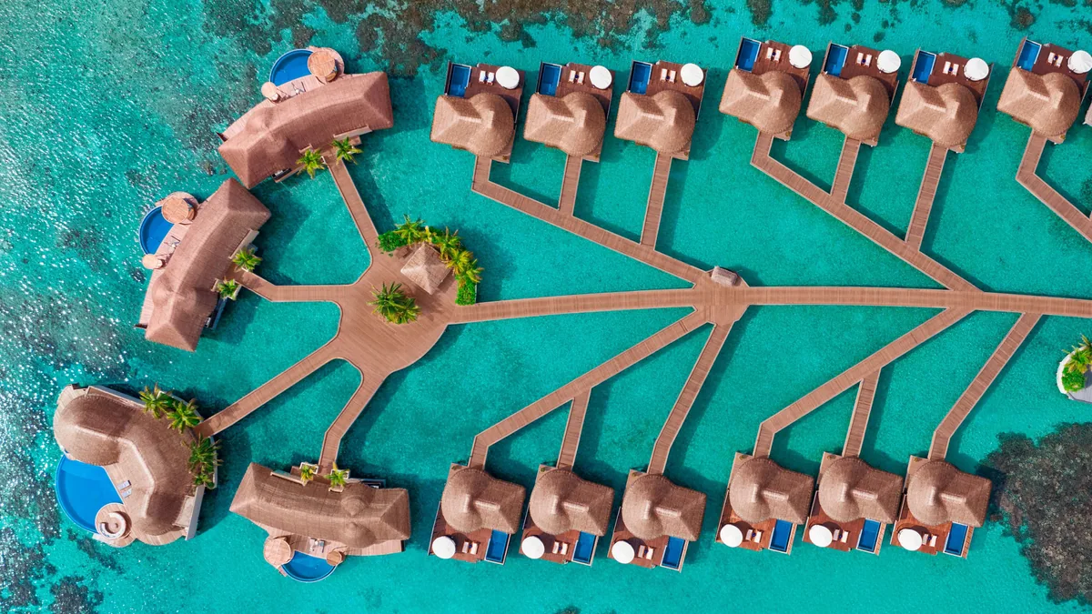 W Maldives, villa overwater, Alif Dhaal (South Ari) Atoll, Maldives, Spectacular Overwater Oasis, the lagoon-side W-brand bold-design configuration.
